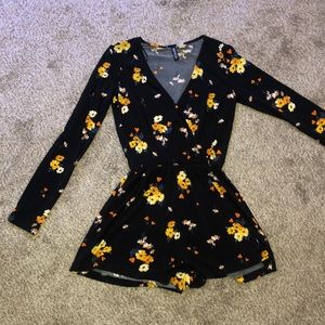 A flowery romper in women’s size 0.